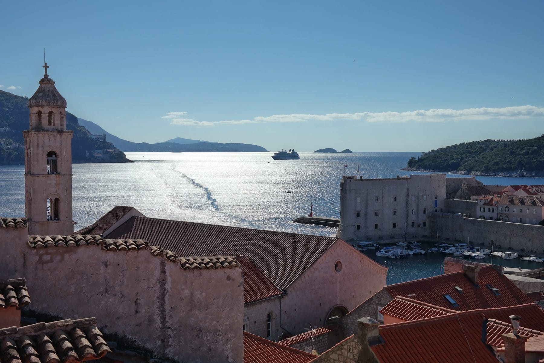 The walled old town of Dubrovnik and its harbour from above