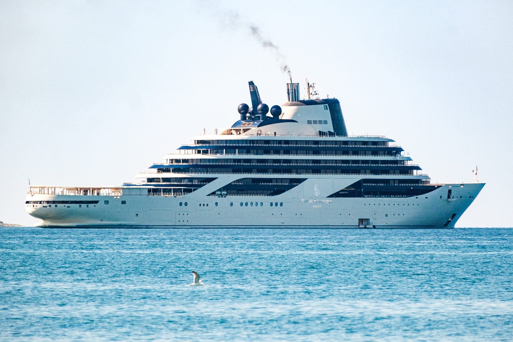 Four Seasons I, the Four Seasons yacht, under way on blue water