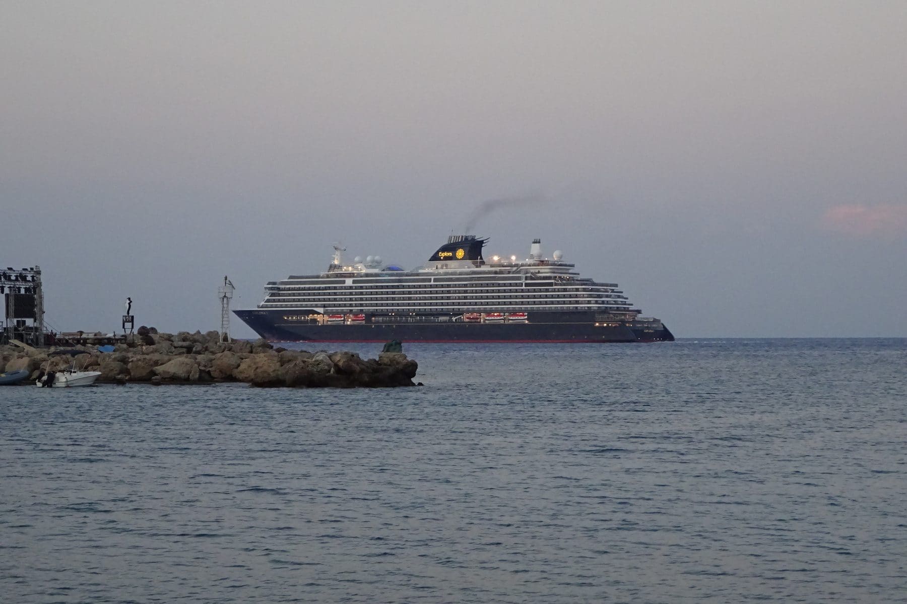 Explora I leaving the port of Rhodes on a clear summer afternoon