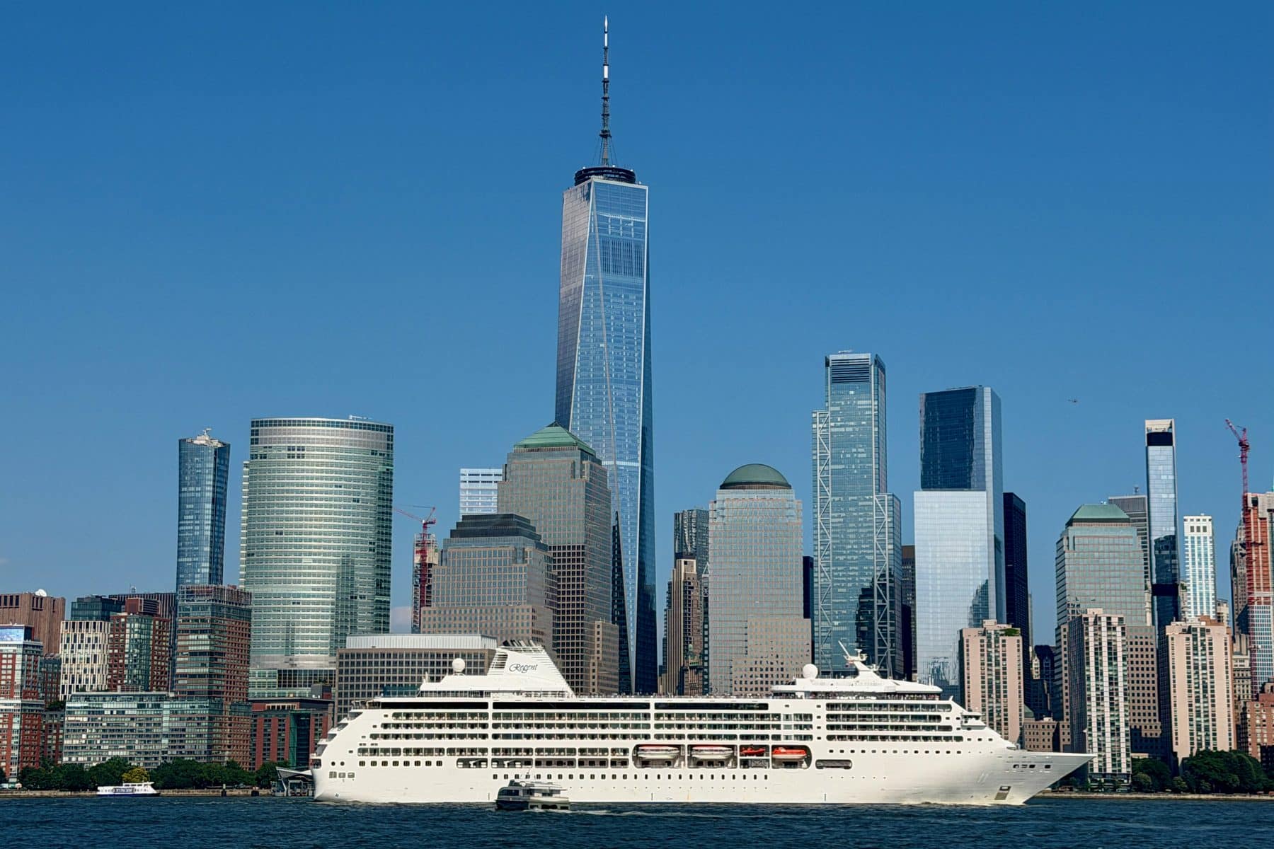 Seven Seas Mariner on the Hudson with the Lower Manhattan skyline behind