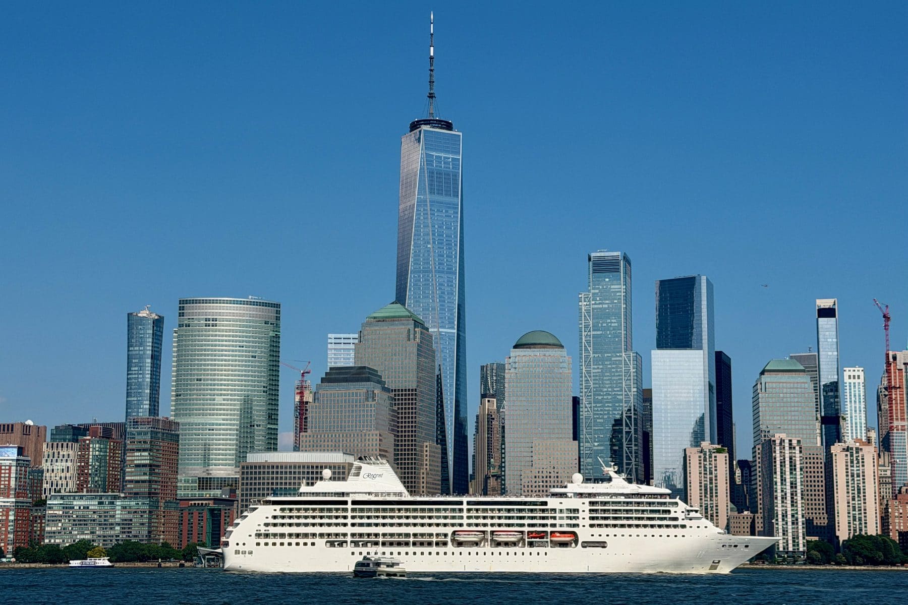 Seven Seas Mariner on the Hudson with the Lower Manhattan skyline behind