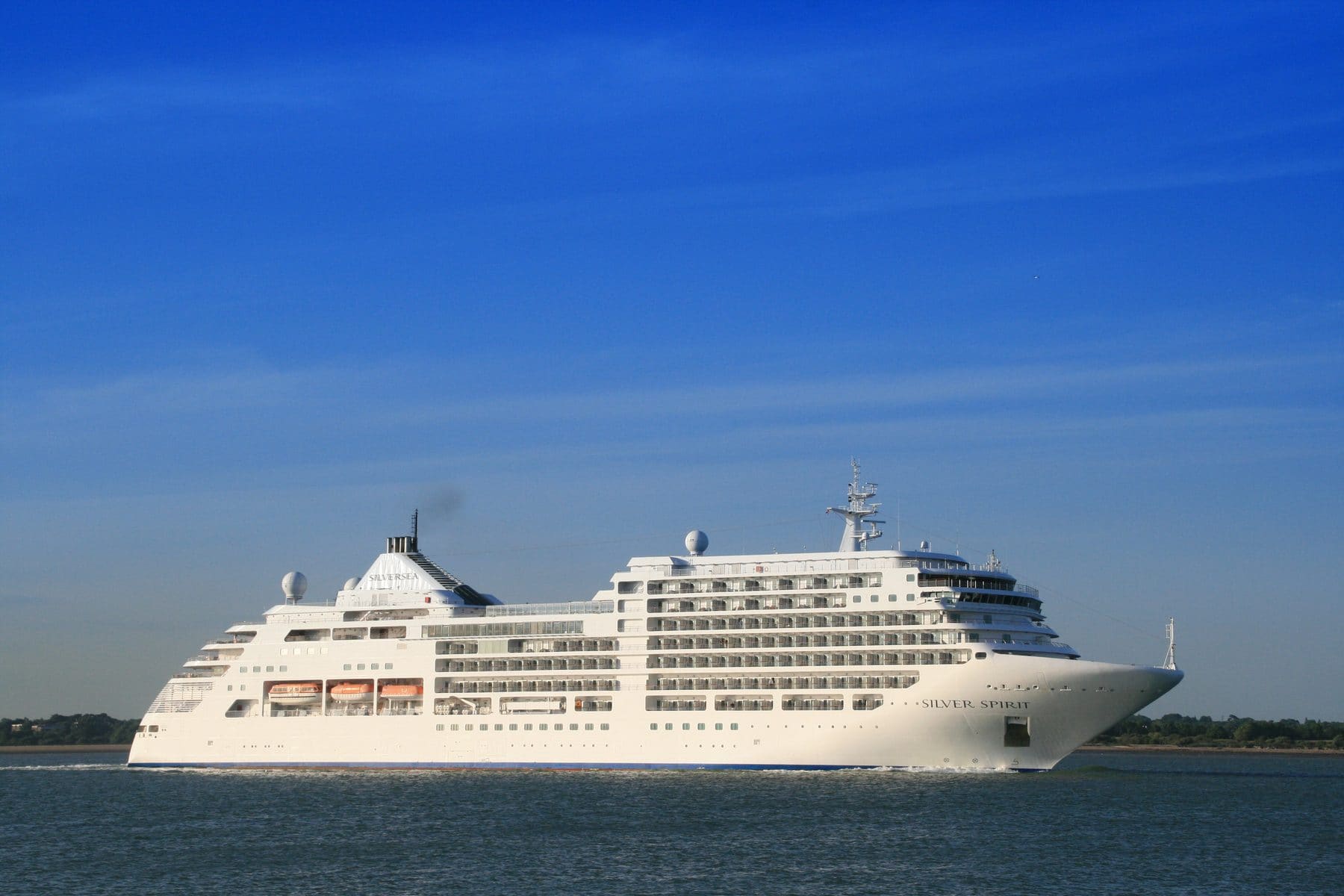 Silver Spirit under way on a calm sea beneath a clear sky