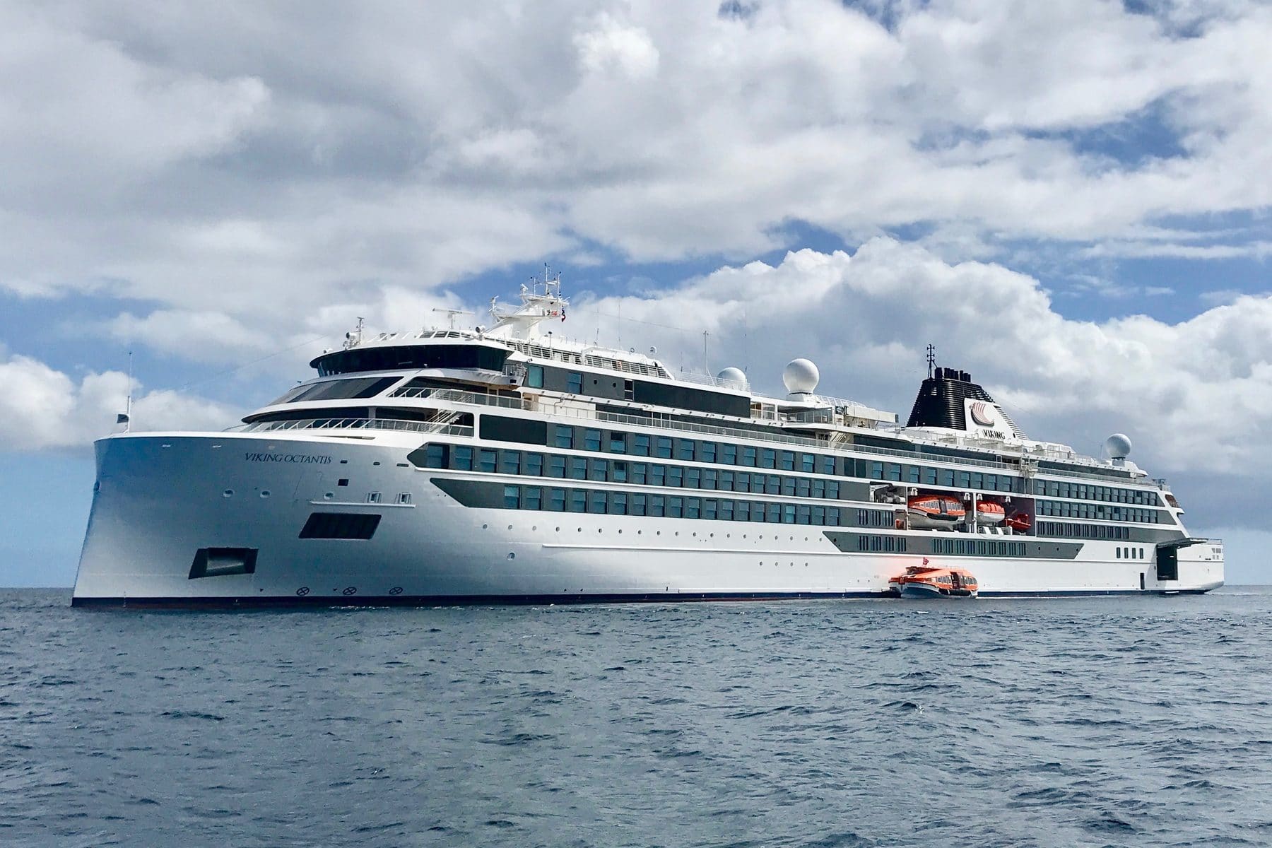 Viking Octantis, the expedition ship, under way under a bright sky